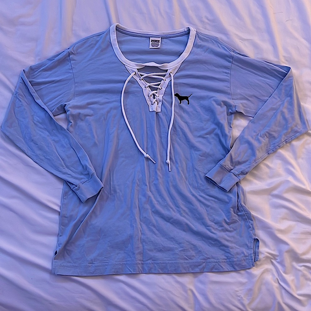 Light blue “PINK” Long sleeved shirt.